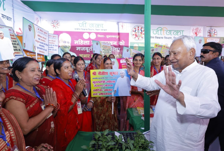 Chief Minister Nitish Kumar seen interacting with a group of women at the inauguration of development projects in Sakra Wajid, Muzaffarpur district, Bihar in October 2025.